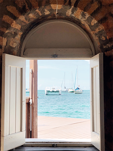 View of sailboats out The Mill's window